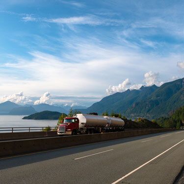 fuel tanker truck crossing bridge