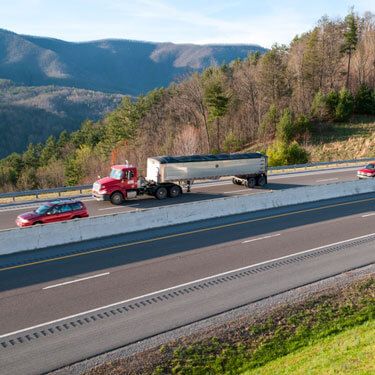 Freight Shipping from Tennessee to New York Semi Truck on the Highway