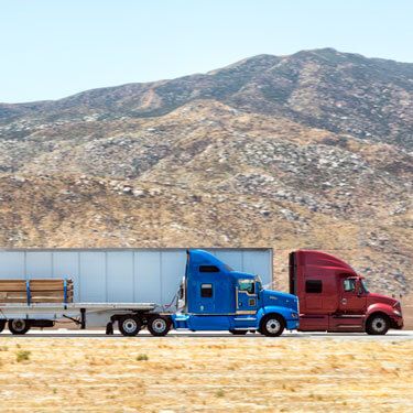 Freight Shipping from Arizona to California - Freight trucks traveling on highway