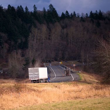 Freight Shipping from West Virginia to New York - Truck on Road in Evening