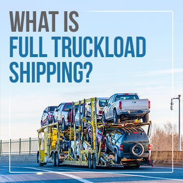 benefits of full truckload with view of departing truck hauling a loaded car carrier